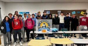 WBC with sign Winners Breakfast Club